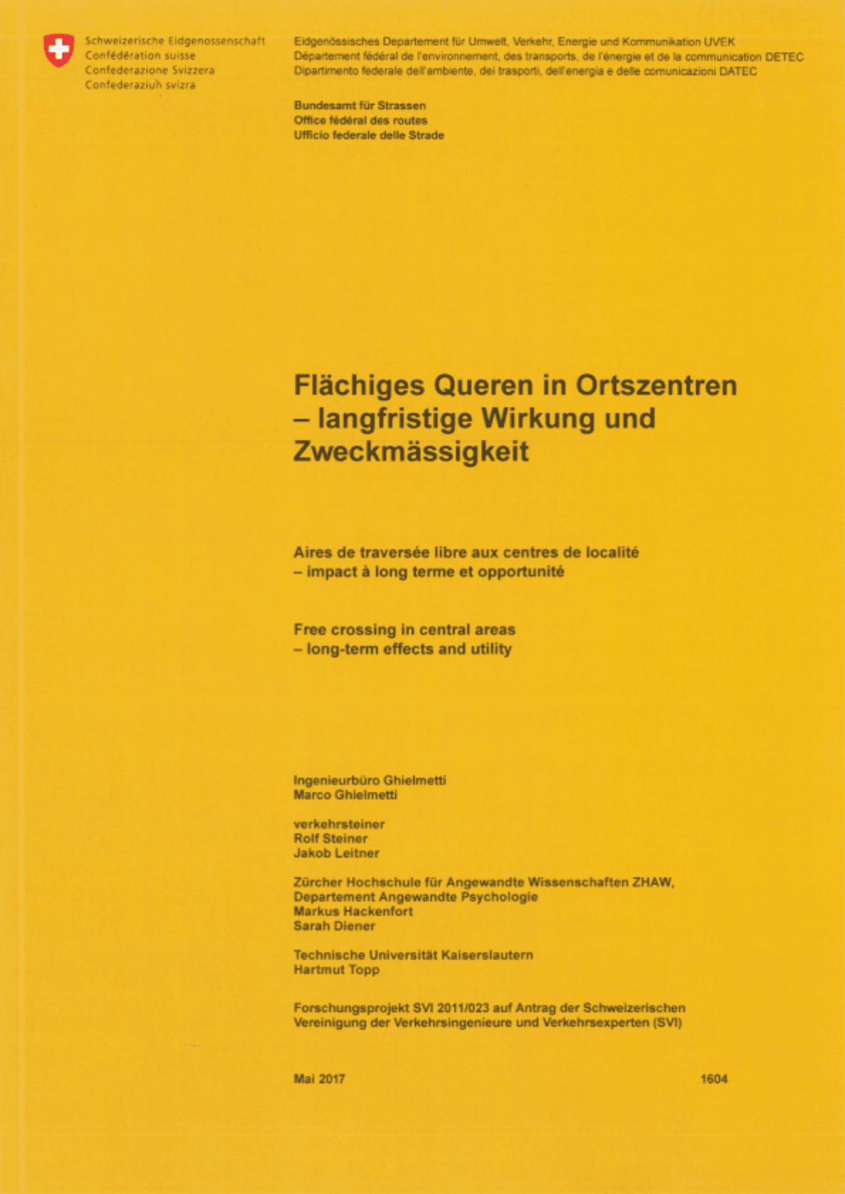 Titelseite des Forschungsberichts «Flächiges Queren in Ortszentren – langfristige Wirkung und Zweckmässigkeit» im Auftrag des Bundesamts für Strassen (ASTRA), erstellt von Ingenieurbüro Ghielmetti, Verkehrsteiner AG, ZHAW Departement Angewandte Psychologie und Technische Universität Kaiserslautern, Forschungsprojekt SVI 2011/023, Mai 2017. Gelber Hintergrund mit Schweizer Wappen und schwarzer Schrift, keine Verkehrssignale oder Verkehrssituation abgebildet.
